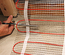 Cut the mesh backing of the mat to make a turn.